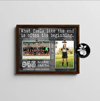 a framed picture of a girl's soccer team