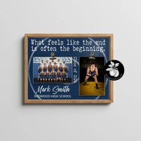 a picture frame with a picture of a wrestling team