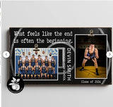 a picture of a wrestling team hanging on a wall