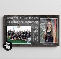 a picture frame with a picture of a girl's lacrosse team